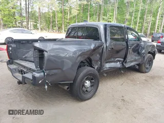 2022 Toyota Tacoma SR with VIN 3TYAX5GN1NT042099, listed as a IAAI auction lot 42081791 with 38,621 mi miles and . Bid and sale history available at DreamBid. Image 4.