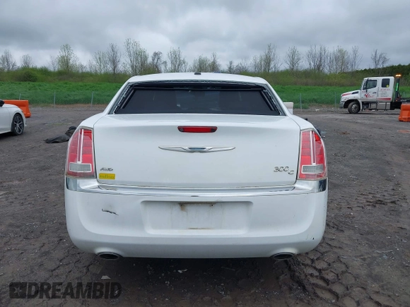 2014 Chrysler 300 C with VIN 2C3CCAKG5EH200996, listed as a IAAI auction lot 42201747 with 156,121 mi miles and . Bid and sale history available at carsss.com. Image 16.