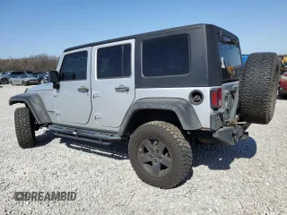 2010 Jeep Wrangler Unlimited Rubicon with VIN 1J4BA6H12AL107485, listed as a Copart auction lot 48802825 with 123,299 mi miles and Salvage title. Bid and sale history available at DreamBid. Image 2.
