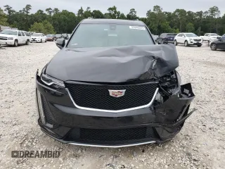 2023 Cadillac XT6 AWD Sport z VIN 1GYKPGRS6PZ126039, wystawiony jako Copart lot #55948605 z przebiegiem 39 966 mil mil oraz Szkoda całkowita • Salvage title. Historia ofert i sprzedaży dostępna na DreamBid. Obrazek 5.