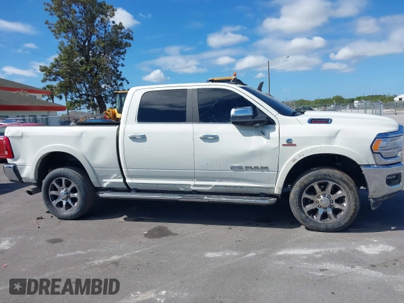 2020 Ram 2500 Longhorn with VIN 3C6UR5GL6LG230556, listed as a IAAI auction lot 38787704 with Not provided miles and . Bid and sale history available at DreamBid. Image 12.