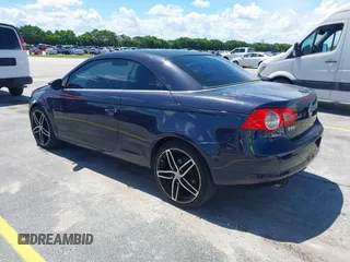 2010 Volkswagen Eos Komfort with VIN WVWBA7AH2AV018698, listed as a IAAI auction lot 42581271 with 91,490 mi miles and . Bid and sale history available at DreamBid. Image 3.