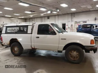2004 Ford Ranger XL z VIN 1FTYR10D14TA08047, wystawiony jako IAAI lot #42831791 z przebiegiem 240 647 mil mil oraz . Historia ofert i sprzedaży dostępna na DreamBid. Obrazek 13.