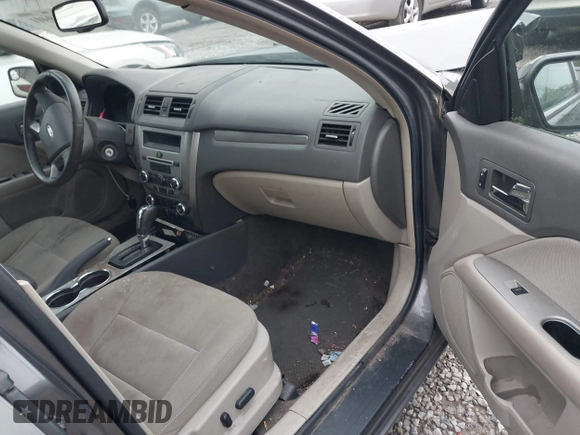 2011 Ford Fusion Hybrid with VIN 3FADP0L39BR345250, listed as a IAAI auction lot 42319401 with 321,317 mi miles and . Bid and sale history available at DreamBid. Image 5.