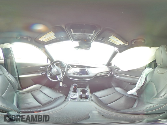 2020 Cadillac XT4 FWD Sport with VIN 1GYFZER49LF123830, listed as a Copart auction lot 55737985 with 98,871 mi miles and Salvage title. Bid and sale history available at DreamBid. Image 15.