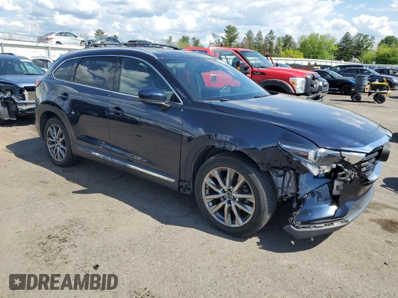 2017 Mazda CX-9 Grand Touring z VIN JM3TCBDY8H0131941, wystawiony jako Copart lot #56199685 z przebiegiem 166 080 mil mil oraz Szkoda całkowita • Salvage title. Historia ofert i sprzedaży dostępna na DreamBid. Obrazek 4.