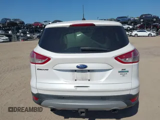 2014 Ford Escape SE with VIN 1FMCU0G94EUA35464, listed as a IAAI auction lot 42046944 with 88,504 mi miles. Bid and sale history available at carsss.com. Image 17.