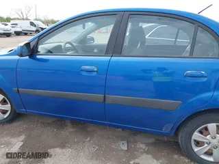2008 Kia Rio LX with VIN KNADE123486430555, listed as a IAAI auction lot 41875641 with 121,280 mi miles. Bid and sale history available at carsss.com. Image 13.
