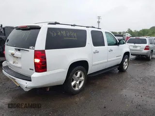 2008 Chevrolet Suburban LTZ z VIN 3GNFK16338G185462, wystawiony jako IAAI lot #42298299 z przebiegiem 301 758 mil mil oraz . Historia ofert i sprzedaży dostępna na DreamBid. Obrazek 4.