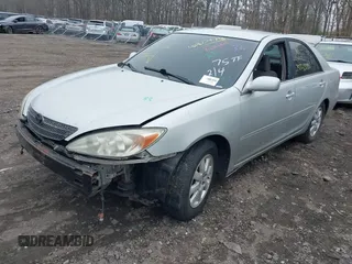 2003 Toyota Camry LE with VIN 4T1BE30K73U704489, listed as a IAAI auction lot 41905778 with Not Provided miles and . Bid and sale history available at DreamBid. Image 2.