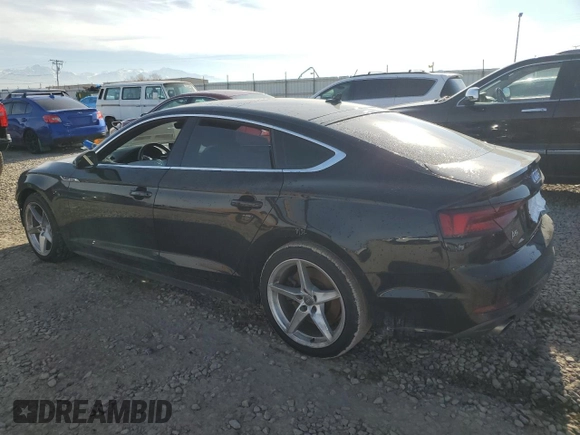 2018 Audi A5 Sportback Premium with VIN WAUDNCF59JA017458, listed as a Copart auction lot 88017795 with 81,412 mi miles and Salvage Title. Bid and sale history available at carsss.com. Image 2.