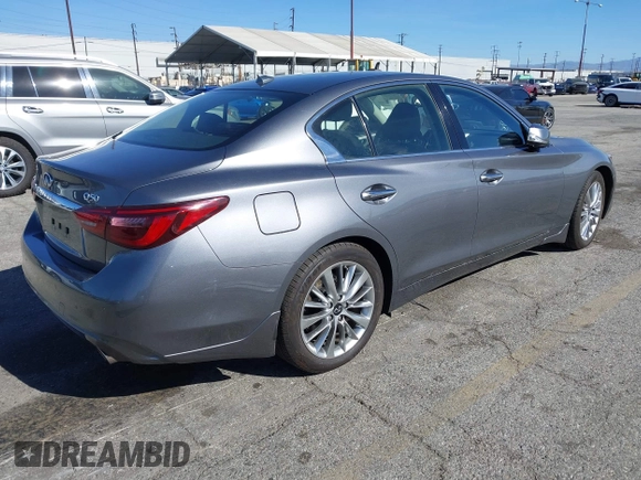 2021 Infiniti Q50 Luxe z VIN JN1EV7BP3MM701871, wystawiony jako IAAI lot #41383333 z przebiegiem 28 634 mil mil oraz . Historia ofert i sprzedaży dostępna na DreamBid. Obrazek 4.