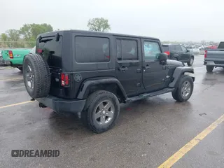 2013 Jeep Wrangler Unlimited Sport z VIN 1C4BJWDGXDL596450, wystawiony jako IAAI lot #42323862 z przebiegiem 114 105 mil mil oraz . Historia ofert i sprzedaży dostępna na DreamBid. Obrazek 4.