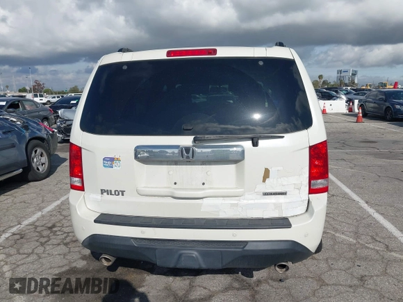 2015 Honda Pilot Touring with VIN 5FNYF3H93FB007766, listed as a IAAI auction lot 41932052 with 131,036 mi miles. Bid and sale history available at carsss.com. Image 16.