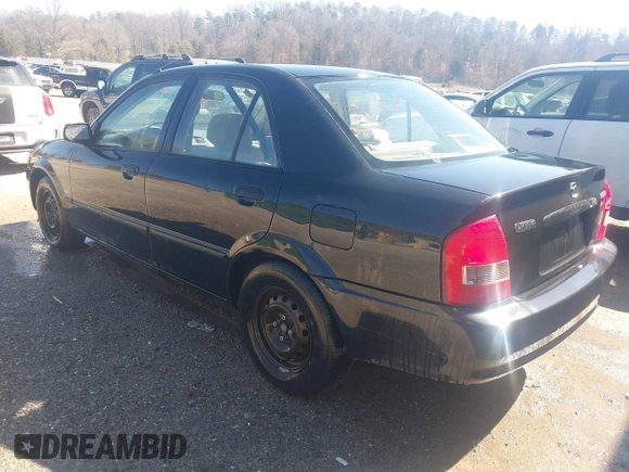 2000 Mazda Protege DX with VIN JM1BJ2227Y0303448, listed as a IAAI auction lot 41482747 with 206,542 mi miles and . Bid and sale history available at DreamBid. Image 3.