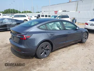 2023 Tesla Model 3 z VIN 5YJ3E1EAXPF414646, wystawiony jako IAAI lot #39514743 z przebiegiem 10 529 mil mil oraz . Historia ofert i sprzedaży dostępna na DreamBid. Obrazek 4.