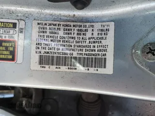 2012 Honda Insight EX z VIN JHMZE2H7XCS002156, wystawiony jako Copart lot #50825825 z przebiegiem 425 939 mil mil oraz Szkoda całkowita • Salvage title. Historia ofert i sprzedaży dostępna na DreamBid. Obrazek 12.