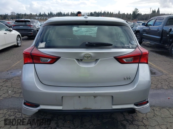 2016 Scion iM with VIN JTNKARJE2GJ508264, listed as a IAAI auction lot 41642646 with 136,213 mi miles. Bid and sale history available at carsss.com. Image 16.