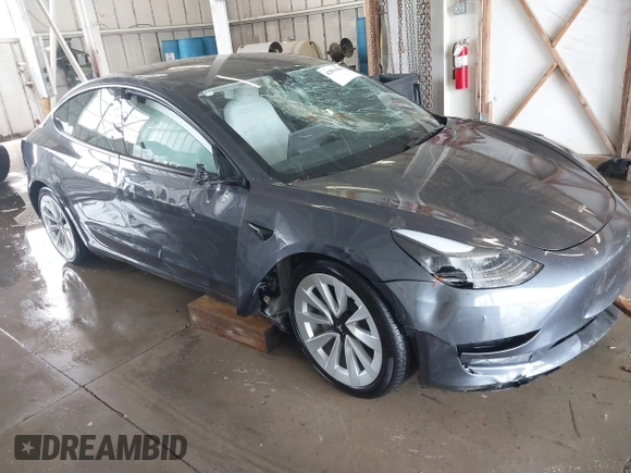 2023 Tesla Model 3 z VIN 5YJ3E1EA2PF591661, wystawiony jako IAAI lot #42014086 z przebiegiem 13 945 mil mil oraz . Historia ofert i sprzedaży dostępna na DreamBid. Obrazek 1.