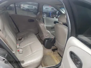 1996 Saturn SL with VIN 1G8ZK5272TZ265571, listed as a Copart auction lot 51267475 with 142,824 mi miles and Salvage Title. Bid and sale history available at carsss.com. Image 10.