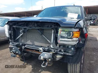 2014 GMC Sierra 1500 Denali z VIN 3GTU2WEC6EG401458, wystawiony jako IAAI lot #41935704 z przebiegiem 149 136 mil mil oraz . Historia ofert i sprzedaży dostępna na DreamBid. Obrazek 6.