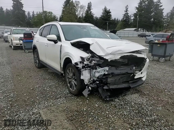 2021 Mazda CX-5 Signature with VIN JM3KFBEY3M0410998, listed as a Copart auction lot 54868885 with 73,207 mi miles and Salvage Title. Bid and sale history available at carsss.com. Image 14.