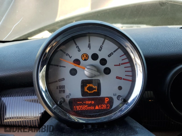 2010 MINI Hardtop with VIN WMWMF3C52ATZ62824, listed as a Copart auction lot 55175395 with 110,585 mi miles and Salvage Title. Bid and sale history available at DreamBid. Image 9.