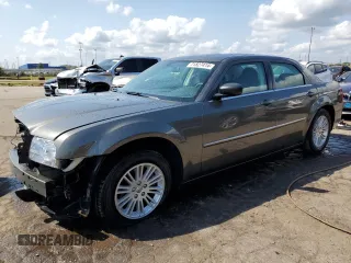 2009 Chrysler 300 LX with VIN 2C3KA43DX9H517198, listed as a Copart auction lot 71827414 with 81,888 mi miles and Clean Title. Bid and sale history available at carsss.com. Image 1.