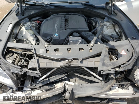2014 BMW 7 Series 740i z VIN WBAYA6C51ED144132, wystawiony jako Copart lot #55131365 z przebiegiem 116 826 mil mil oraz Szkoda całkowita • Salvage title. Historia ofert i sprzedaży dostępna na DreamBid. Obrazek 11.