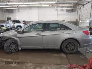 2013 Chrysler 200 Touring with VIN 1C3CCBBB5DN602677, listed as a IAAI auction lot 41644651 with 183,556 mi miles. Bid and sale history available at carsss.com. Image 15.