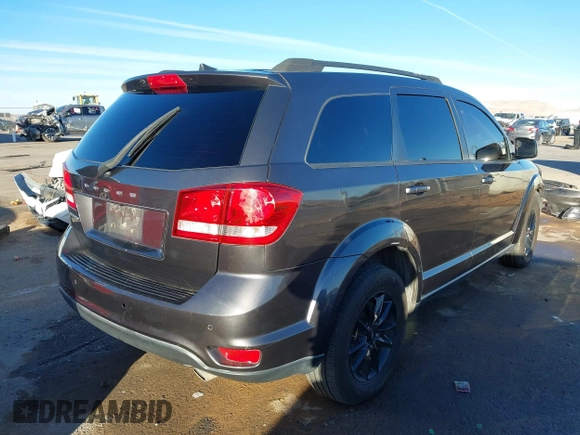 2019 Dodge Journey SE with VIN 3C4PDCBG7KT872888, listed as a IAAI auction lot 41390094 with 114,513 mi miles and . Bid and sale history available at DreamBid. Image 4.