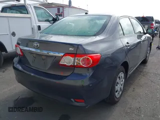 2011 Toyota Corolla L with VIN JTDBU4EE7B9162022, listed as a IAAI auction lot 42066643 with 124,384 mi miles. Bid and sale history available at carsss.com. Image 4.