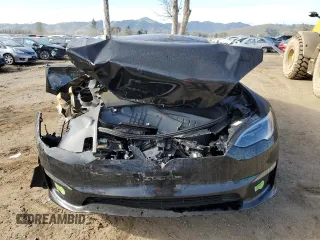 2023 Tesla Model S with VIN 5YJSA1E57PF507456, listed as a Copart auction lot 44649945 with 8,760 mi miles and Salvage title. Bid and sale history available at DreamBid. Image 5.