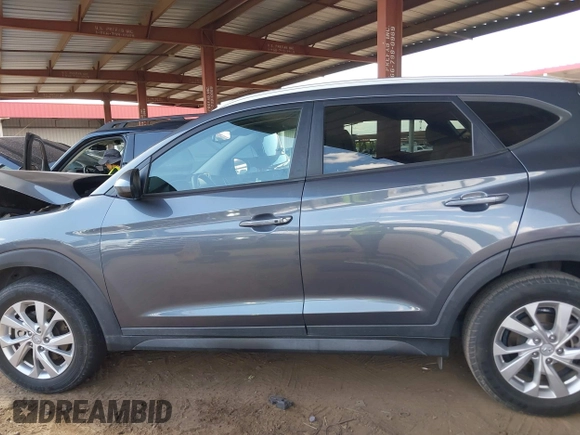 2021 Hyundai Tucson Value with VIN KM8J33A44MU403018, listed as a IAAI auction lot 42074597 with 63,654 mi miles and . Bid and sale history available at DreamBid. Image 15.