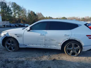 2023 Genesis GV80 z VIN KMUHCESC9PU123083, wystawiony jako IAAI lot #41166075 z przebiegiem 20 216 mil mil oraz . Historia ofert i sprzedaży dostępna na DreamBid. Obrazek 6.
