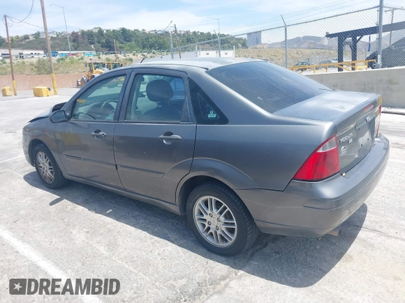 2007 Ford Focus S z VIN 1FAFP34N17W123378, wystawiony jako IAAI lot #42208033 z przebiegiem 183 803 mil mil oraz . Historia ofert i sprzedaży dostępna na DreamBid. Obrazek 3.