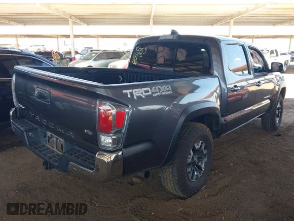 2022 Toyota Tacoma SR z VIN 3TYCZ5AN1NT062445, wystawiony jako IAAI lot #41967336 z przebiegiem Nie podano mil oraz . Historia ofert i sprzedaży dostępna na DreamBid. Obrazek 4.