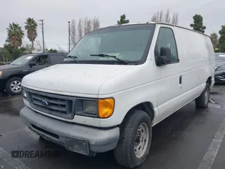 2004 Ford Econoline Cargo with VIN 1FTRE14W44HA43969, listed as a IAAI auction lot 41488289 with 268,097 mi miles. Bid and sale history available at carsss.com. Image 2.
