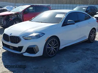 2021 BMW 2 Series M235i xDrive with VIN WBA13AL06M7G61056, listed as a IAAI auction lot 41140205 with 49,413 mi miles and . Bid and sale history available at DreamBid. Image 6.