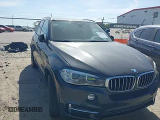 2014 BMW X5 xDrive35d with VIN 5UXKS4C57E0J93982, listed as a IAAI auction lot 42085173 with 169,908 mi miles. Bid and sale history available at carsss.com. Image 19.