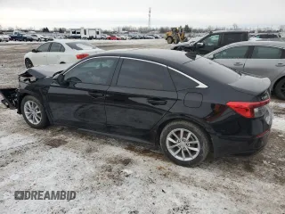 2024 Honda Civic Sedan EX with VIN 2HGFE2F32RH117663, listed as a Copart auction lot 86250814 with 12,043 mi miles and Salvage Title. Bid and sale history available at carsss.com. Image 2.