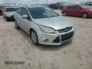 2012 Ford Focus SE with VIN 1FAHP3F29CL287498, listed as a Copart auction lot 61476855 with 139,801 mi miles and Salvage title. Bid and sale history available at DreamBid. Image 13.