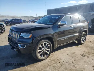2017 Jeep Grand Cherokee Overland with VIN 1C4RJFCT7HC684746, listed as a Copart auction lot 83259314 with 106,848 mi miles and Salvage Title. Bid and sale history available at carsss.com. Image 1.