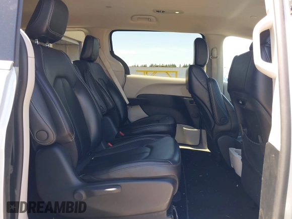 2023 Chrysler Pacifica Hybrid Touring L with VIN 2C4RC1L75PR614460, listed as a IAAI auction lot 42628545 with 68,668 mi miles and . Bid and sale history available at DreamBid. Image 8.