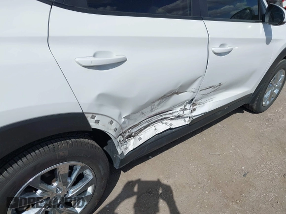 2019 Hyundai Tucson SE with VIN KM8J2CA43KU870933, listed as a IAAI auction lot 41972884 with 53,029 mi miles. Bid and sale history available at carsss.com. Image 6.