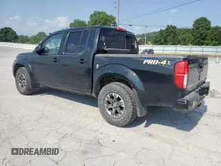 2017 Nissan Frontier Pro-4X with VIN 1N6DD0EV4HN754380, listed as a Copart auction lot 58810955 with 95,325 mi miles and Salvage title. Bid and sale history available at DreamBid. Image 2.
