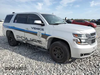 2018 Chevrolet Tahoe Commercial with VIN 1GNLCDEC2JR275159, listed as a Copart auction lot 61337355 with 84,712 mi miles and Salvage title. Bid and sale history available at DreamBid. Image 4.