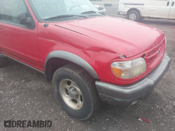 1999 Ford Explorer Sport z VIN 1FMYU24X5XUA19152, wystawiony jako IAAI lot #42473945 z przebiegiem Nie podano mil oraz . Historia ofert i sprzedaży dostępna na DreamBid. Obrazek 6.