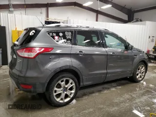 2015 Ford Escape Titanium with VIN 1FMCU9JX0FUA03009, listed as a Copart auction lot 50948755 with 133,748 mi miles and Salvage Title. Bid and sale history available at DreamBid. Image 3.