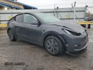 2024 Tesla Model Y z VIN 7SAYGDED4RF125330, wystawiony jako Copart lot #81385224 z przebiegiem 3 631 mil mil oraz Szkoda całkowita • Salvage title. Historia ofert i sprzedaży dostępna na DreamBid. Obrazek 4.